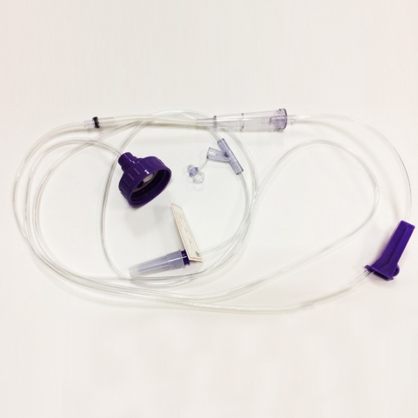 Enteral feeding spike set with cap